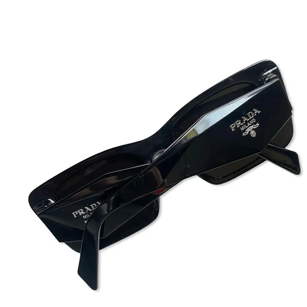 Prada Eyewear black square frame sunglasses logo sides Revolve in case $489